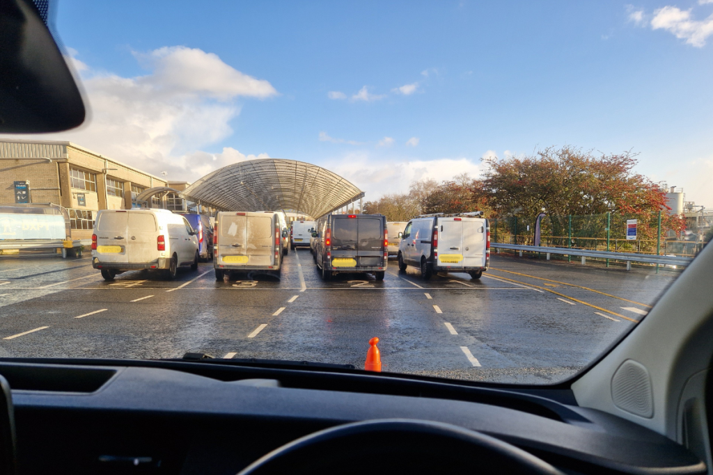 the view from the van entering an amazon depot