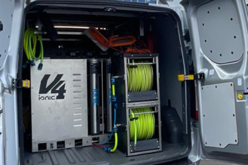 a van filled with conservatory cleaning equipment