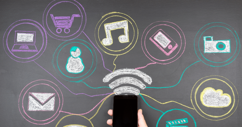 a smartphone with chalkboard icons representing social media